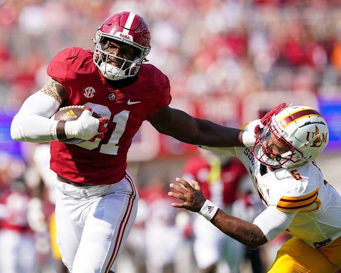 USA; Alabama Crimson Tide linebacker Will Anderson Jr. (31) and Louisiana Monroe Warhawks quarterback Chandler Rogers (6) during the first half at Bryant-Denny Stadium.